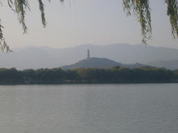 Kunming Lake at the Summer Palace and the Jade Spring Hill with the Yufeng Pagoda, viewed from the South Lake Island