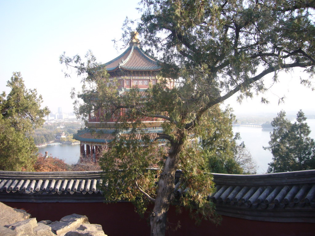 The back side of the Tower of Buddhist Incense, Kunming Lake, the Seventeen-Arch Bridge and South Lake Island at the Summer Palace, viewed from the Hall of the Sea of Wisdom