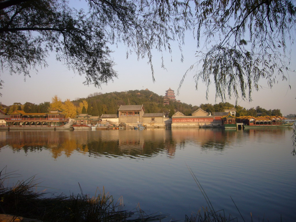 Boats at the northwest side of Kunming Lake and Longevity Hill with the Tower of Buddhist Incense at the Summer Palace, viewed from the West Causeway