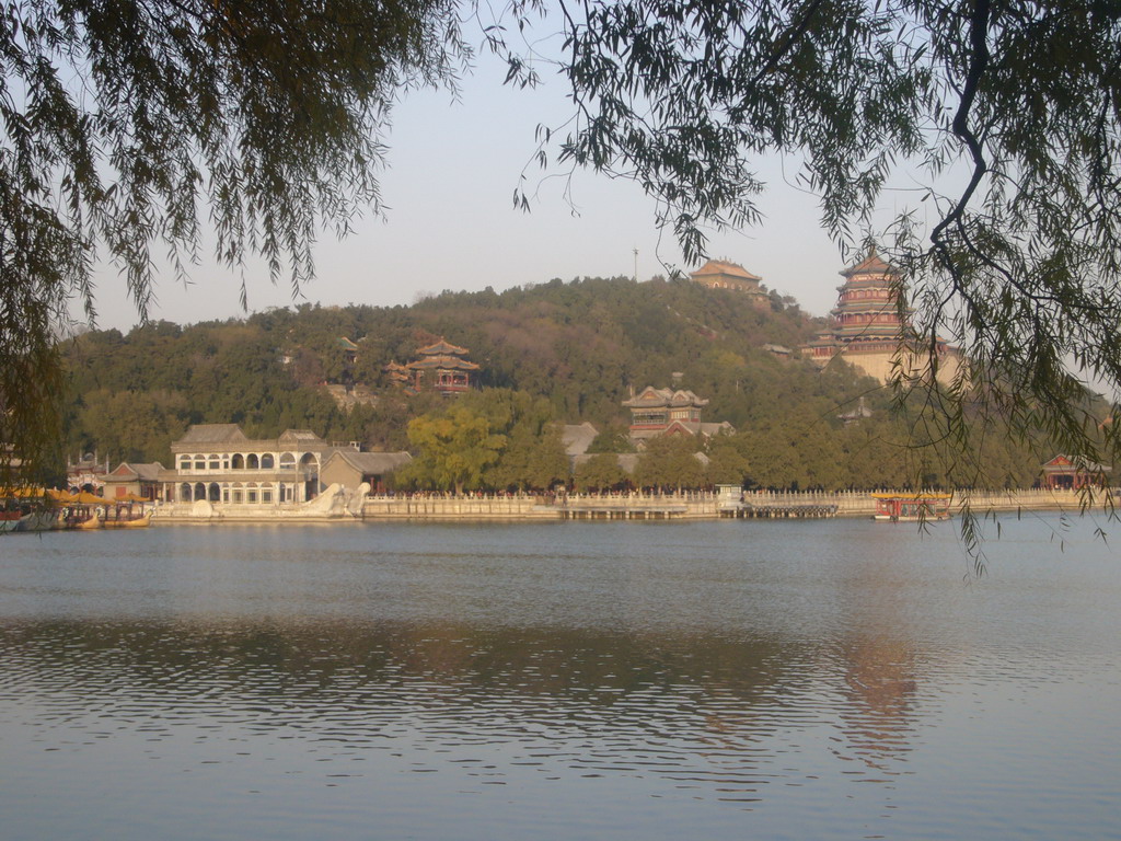 The Marble Boat and other boats at the northwest side of Kunming Lake and Longevity Hill with the Tower of Buddhist Incense and the Hall of the Sea of Wisdom at the Summer Palace, viewed from the West Causeway