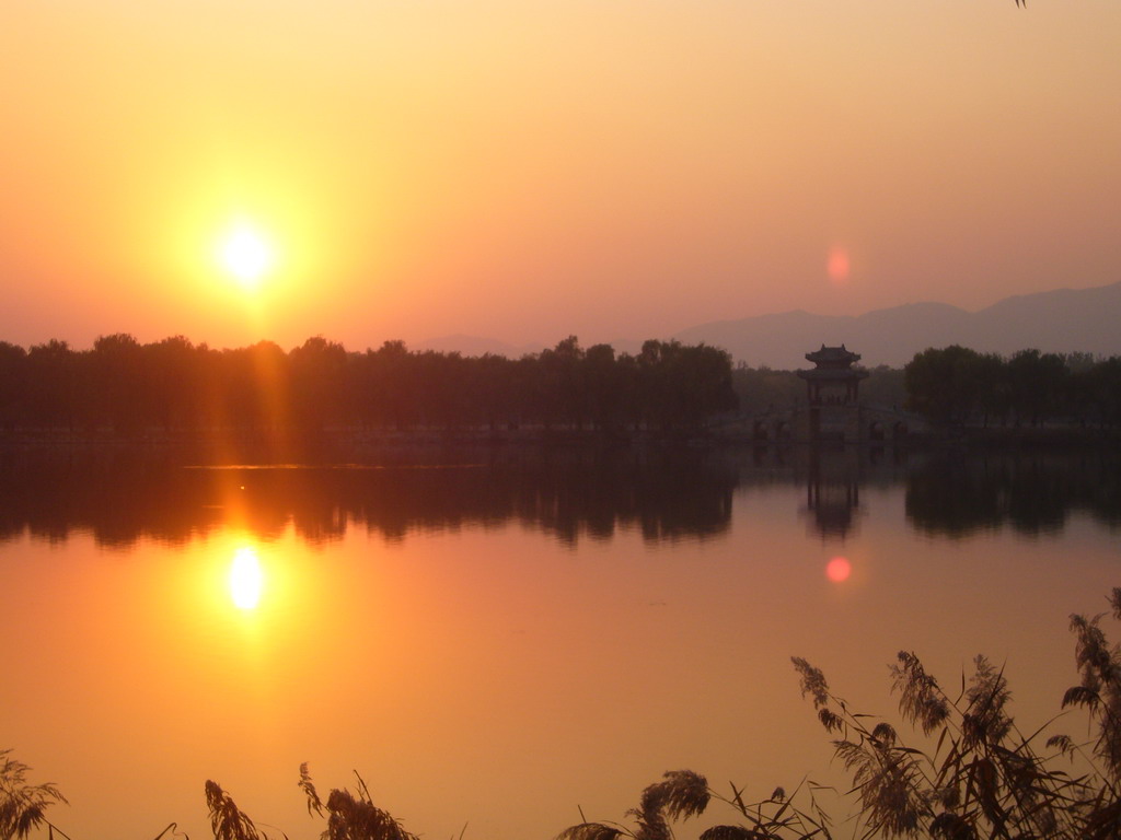 Kunming Lake and the Willow Bridge at the Summer Palace, at sunset