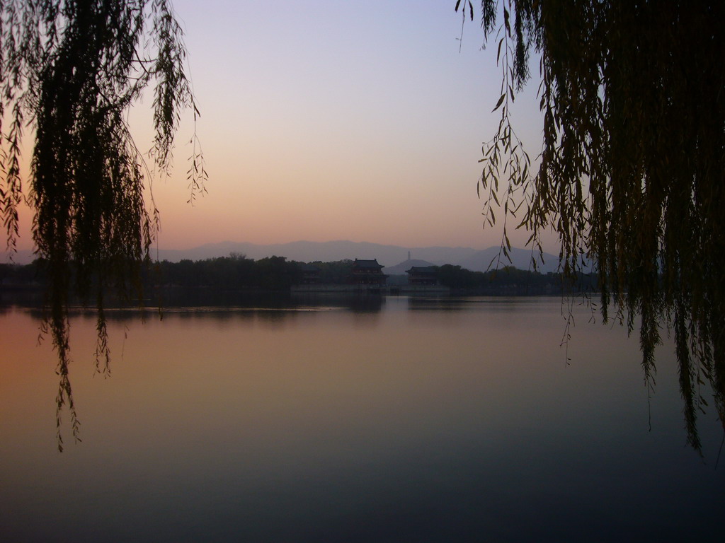 Kunming Lake and the Pavilion of Bright Scenery at the Summer Palace, and the Jade Spring Hill with the Yufeng Pagoda, at sunset