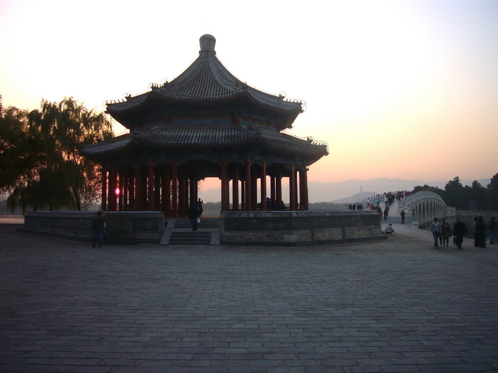 The Pavilion of Broad View, the Seventeen-Arch Bridge and South Lake Island at the Summer Palace, and the Jade Spring Hill with the Yufeng Pagoda, at sunset