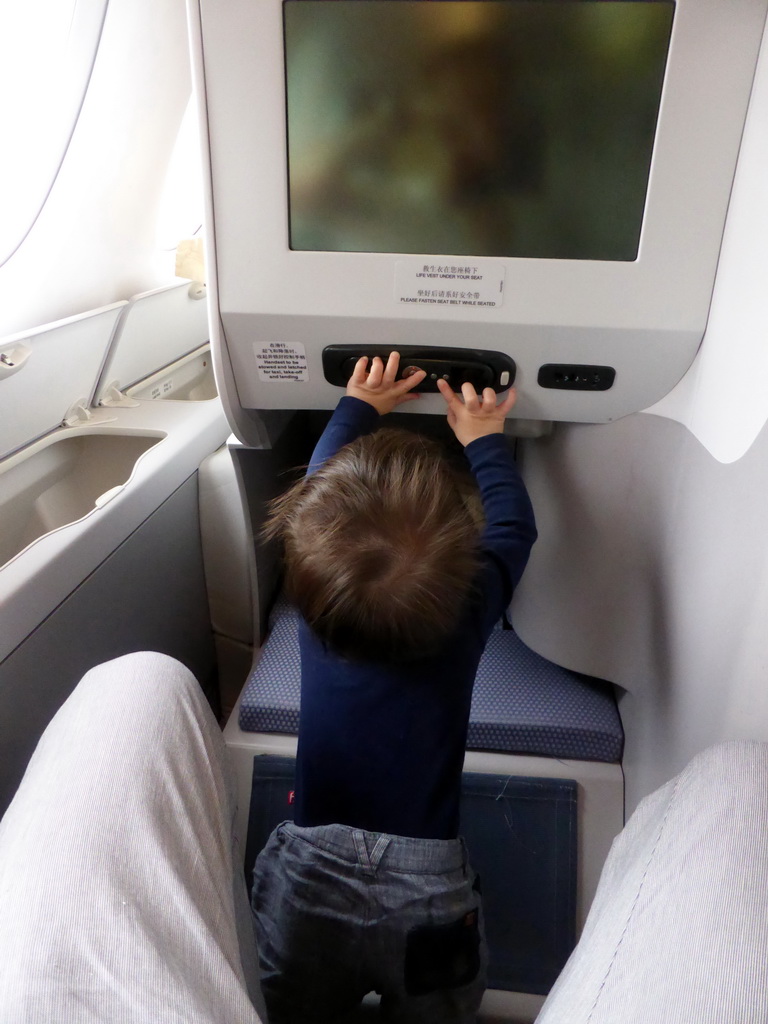 Max in the airplane from Amsterdam