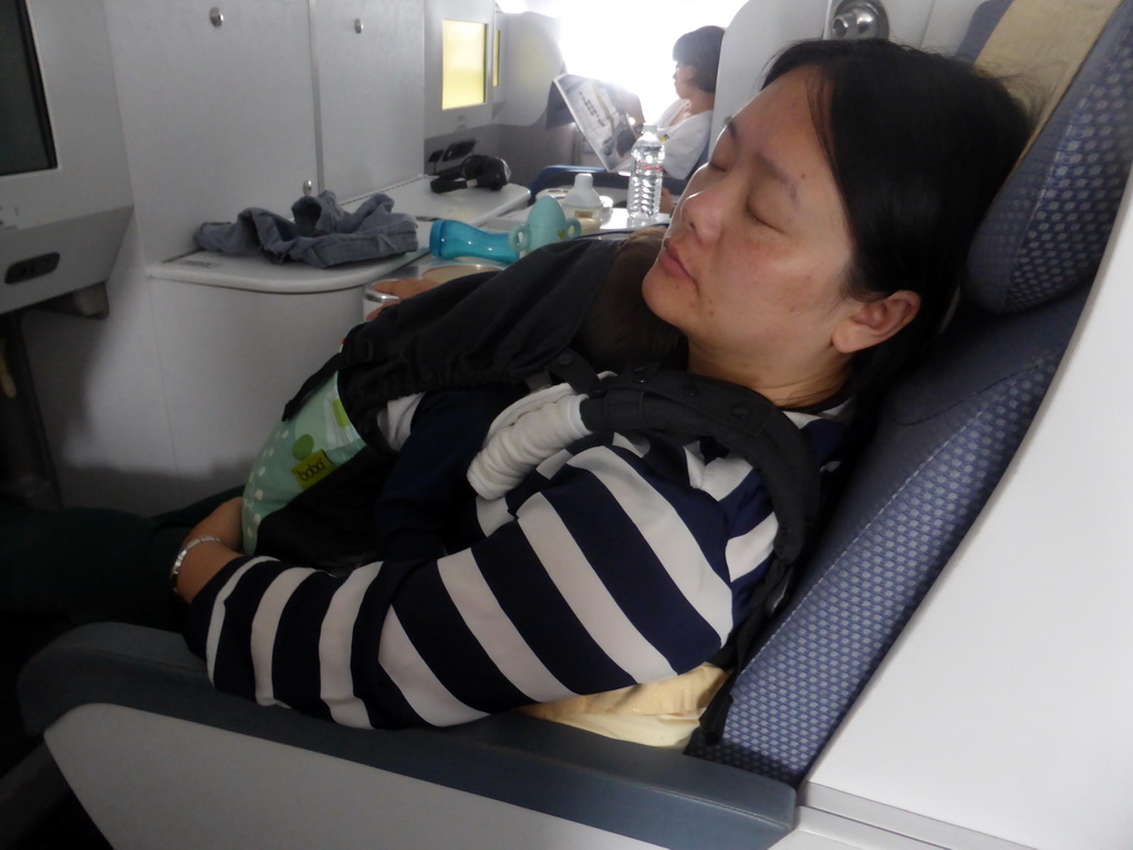 Miaomiao and Max in the airplane from Amsterdam