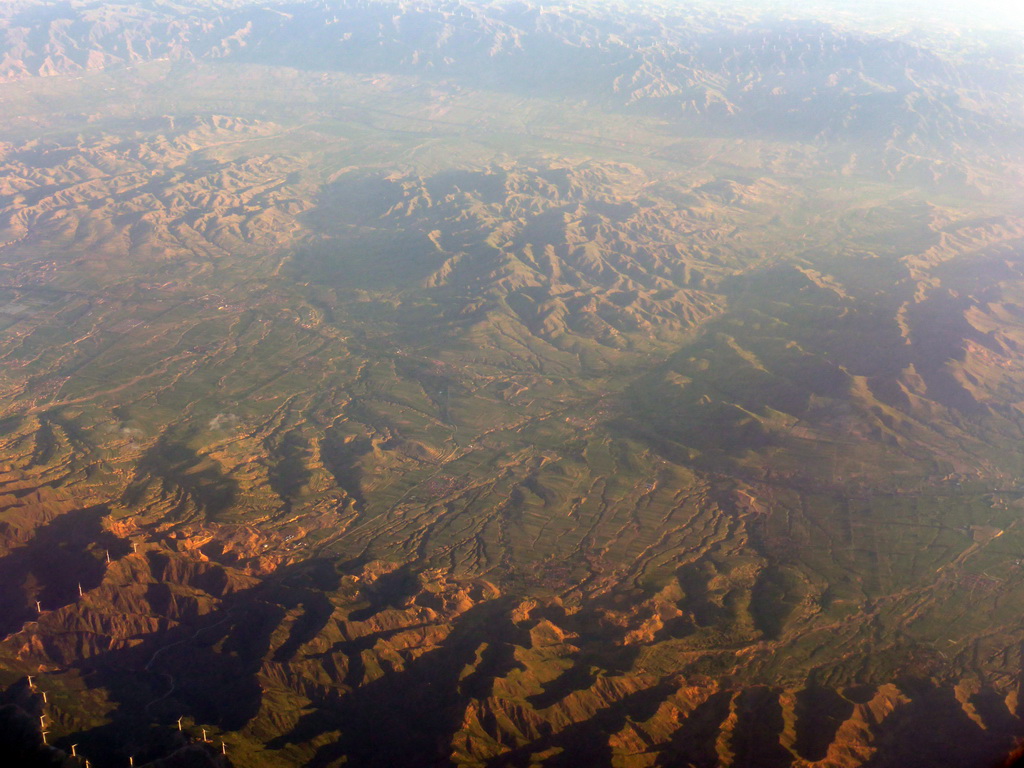 Mountains on the west side of the city, viewed from the airplane from Amsterdam