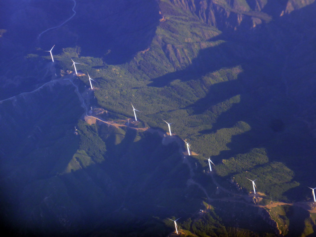Windmills in the mountains on the west side of the city, viewed from the airplane from Amsterdam