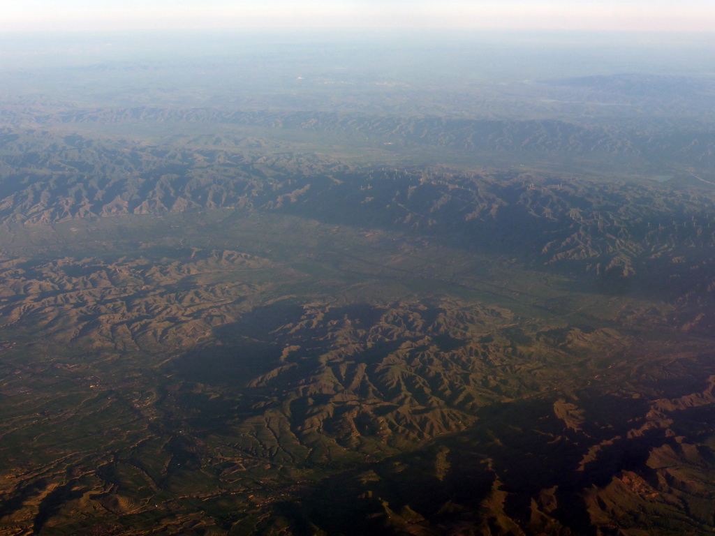 Mountaisn and river on the west side of the city, viewed from the airplane from Amsterdam