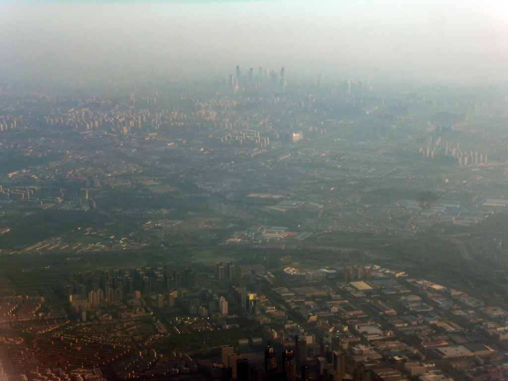 South side of the city with the South 5th Ring Road, and skyscrapers in the city center, viewed from the airplane from Amsterdam