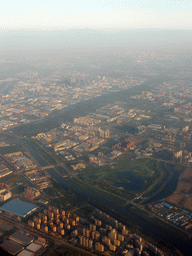 Southeast side of the city with the G2 Jinghu Expressway, the Liangshui river and the Tonghui Heguan canal, viewed from the airplane from Amsterdam
