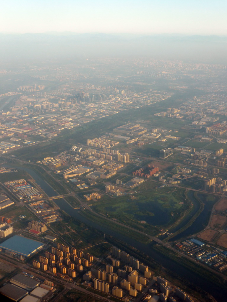 Southeast side of the city with the G2 Jinghu Expressway, the Liangshui river and the Tonghui Heguan canal, viewed from the airplane from Amsterdam