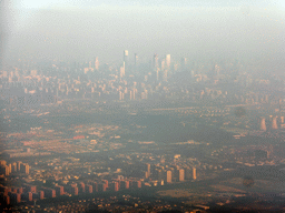 Southeast side of the city and skyscrapers in the city center, viewed from the airplane from Amsterdam