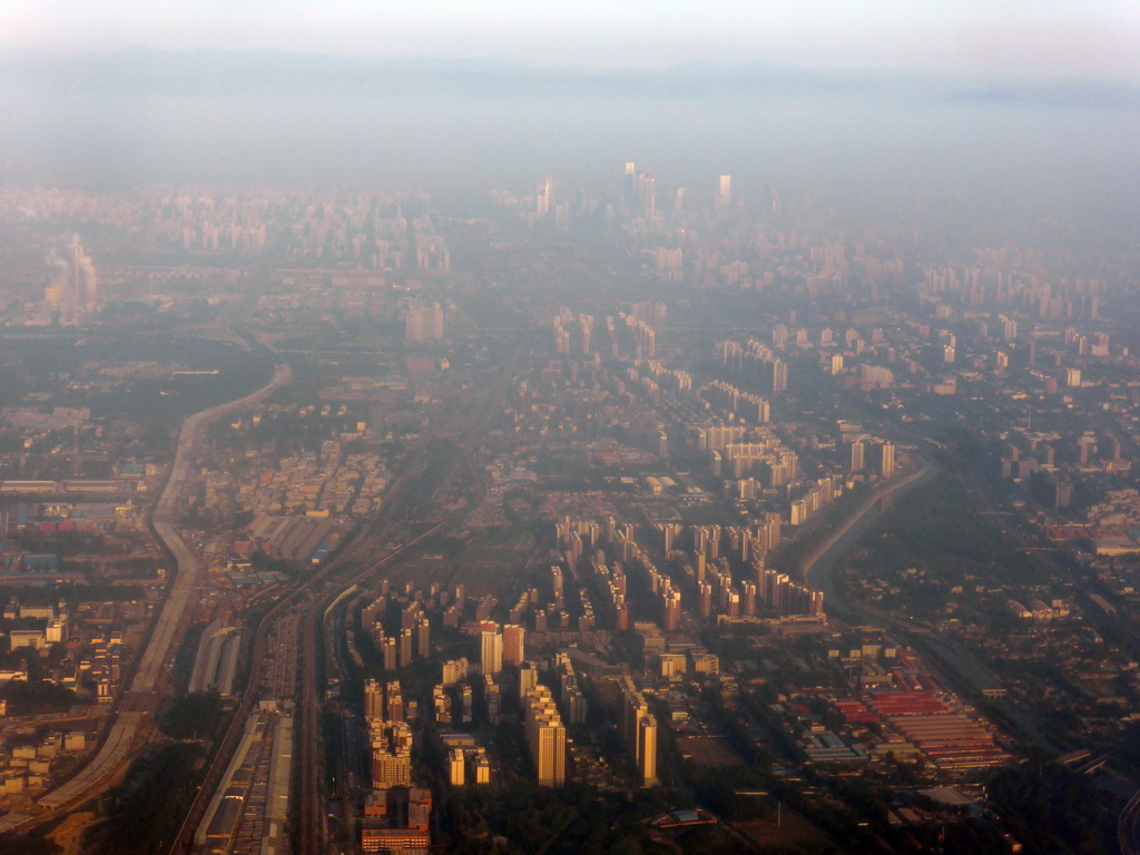 East side of the city and skyscrapers in the city center, viewed from the airplane from Amsterdam