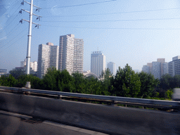 Buildings at the northeast side of the city, viewed from the taxi on the S12 Airport Expressway