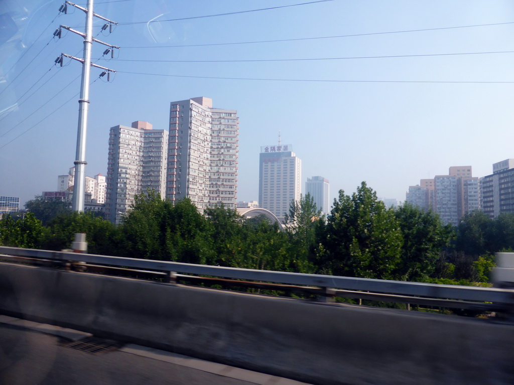 Buildings at the northeast side of the city, viewed from the taxi on the S12 Airport Expressway