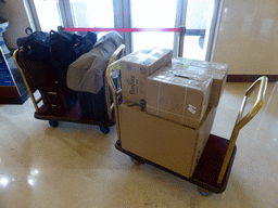 Our suitcases and boxes with babyfood in the lobby of the Qianmen Jianguo Hotel