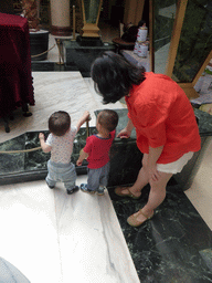 Max with his aunt and cousin in the central hall of the Qianmen Jianguo Hotel