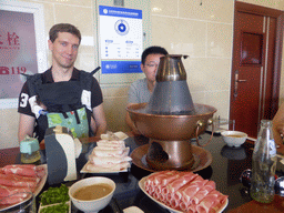 Tim, Max and the husband of Miaomiao`s cousin having lunch at the Qingyi Grassland fondue restaurant