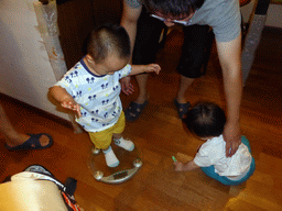 Max, his second cousin and the husband of Miaomiao`s cousin in the apartment of Miaomiao`s cousin