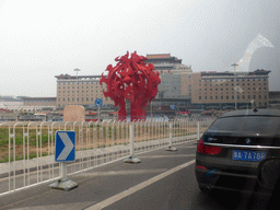 Piece of art at the Beijing West Railway Station South Road and the front of the Beijing West Railway Station, viewed from the car