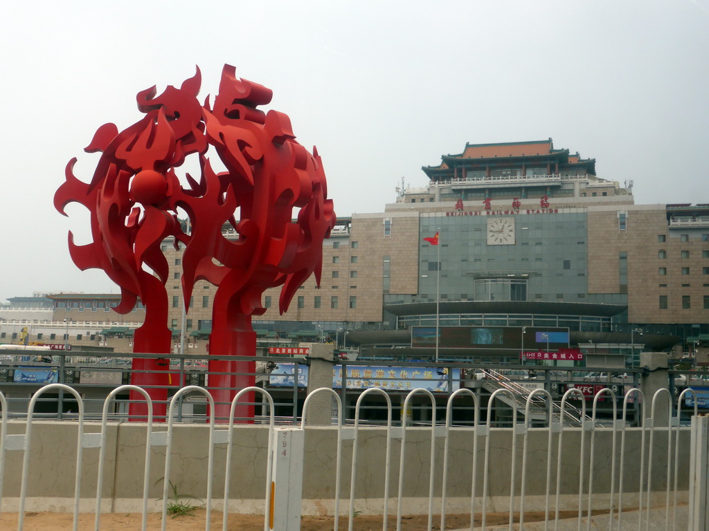 Piece of art at the Beijing West Railway Station South Road and the front of the Beijing West Railway Station, viewed from the car