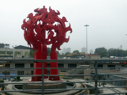 Piece of art at the Beijing West Railway Station South Road, viewed from the car