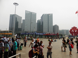 Piece of art and office buildings at the south side of the Beijing West Railway Station