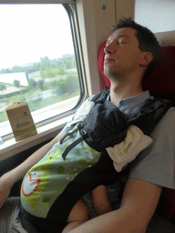 Tim and Max sleeping in the high speed train to Zhengzhou