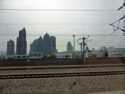 beijing_2_151 - 236 kb - 1024x768 - Buildings in the south part of Shijiazhuang, viewed from the high speed train to Zhengzhou Buildings in the south part of Shijiazhuang, viewed from the high speed train to Zhengzhou