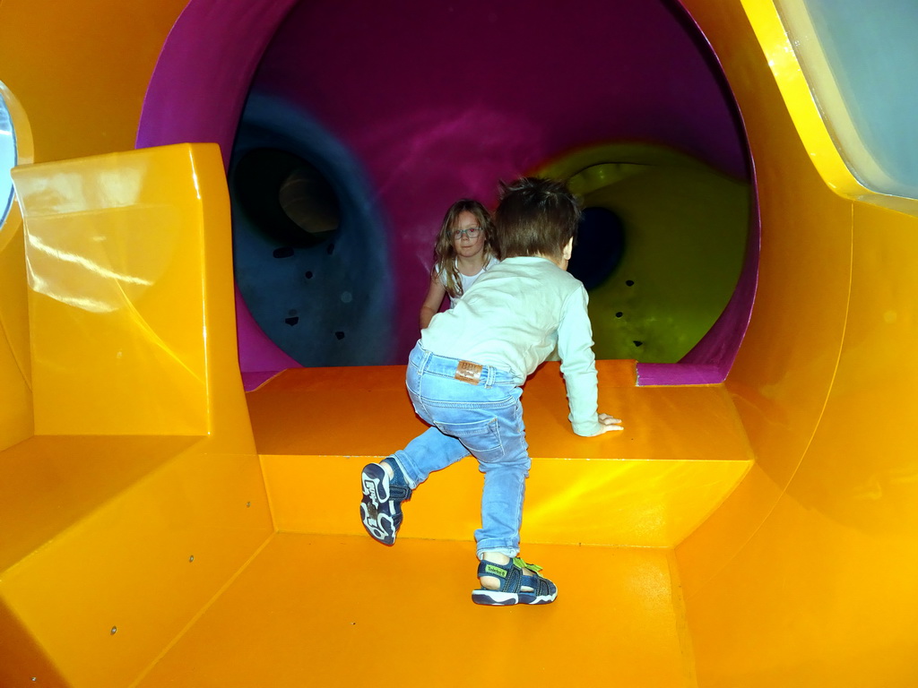 Max at the KLM airplane playground at the Departures Hall of Schiphol Airport