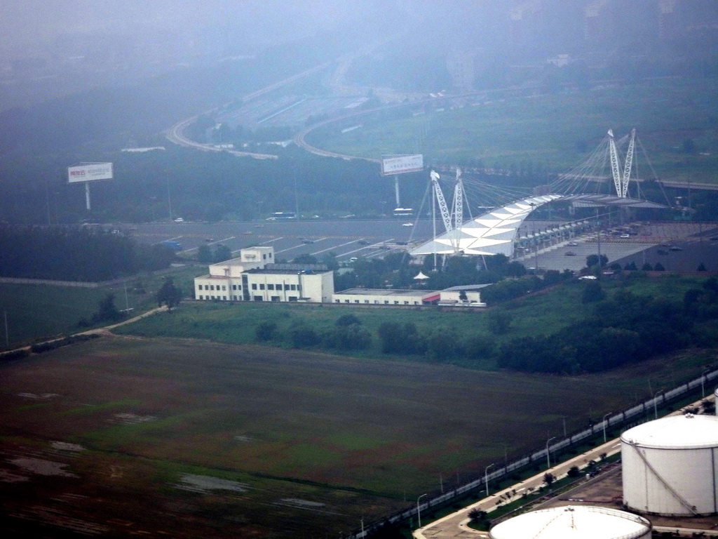 Entry to a tollroad on the northeast side of the city, viewed from the airplane from Dalian