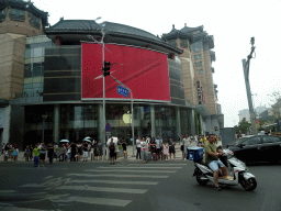 Apple store at the crossing of the Jinyu Hutong street and Wangfujing Street, viewed from the taxi from the airport to the hotel