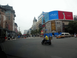 Crossing of the Jinyu Hutong street and Wangfujing Street, viewed from the taxi from the airport to the hotel