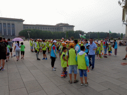 School class in front of the Great Hall of the People at Tiananmen Square