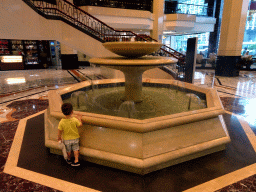 Max at the fountain in the lobby of the Beijing Prime Hotel Wanfujing