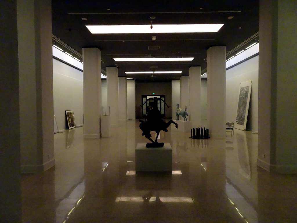 Sculpture and paintings on one of the lower floors of the National Art Museum of China, under renovation