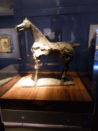 Statue at the Exhibition Hall of Collection Highlights at the sixth floor of the National Art Museum of China, with explanation