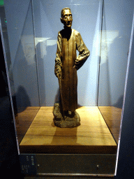Statue at the Exhibition Hall of Collection Highlights at the sixth floor of the National Art Museum of China, with explanation