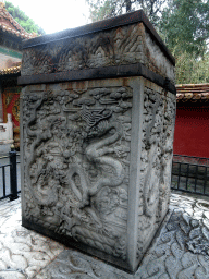 Stone column with reliefs at the Palace of Imperial Peace at the Imperial Garden of the Forbidden City