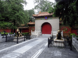 The One Heavenly Gate with golden Chinese Unicorn statues at the Imperial Garden of the Forbidden City
