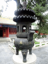 Incense burner in front of the Pu`an Hall at the Jade Flower Island at Beihai Park