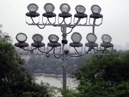 Lamps at the White Pagoda at the Jade Flower Island at Beihai Park, with a view on the northwest side of the Beihai Sea and the Five Dragons Pavilion