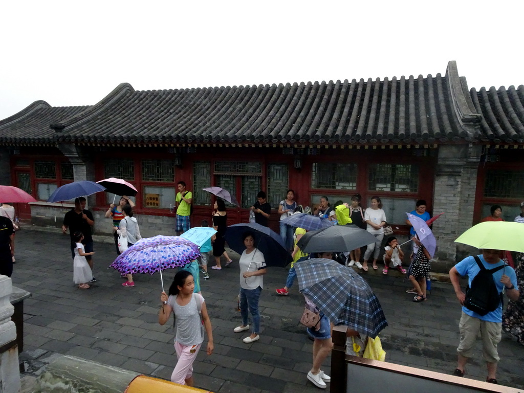 Tourists at the north side of the White Pagoda at the Jade Flower Island at Beihai Park