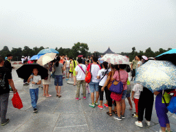 Tourists standing in line for the Heavenly Centre Stone at the Circular Mound at the Temple of Heaven