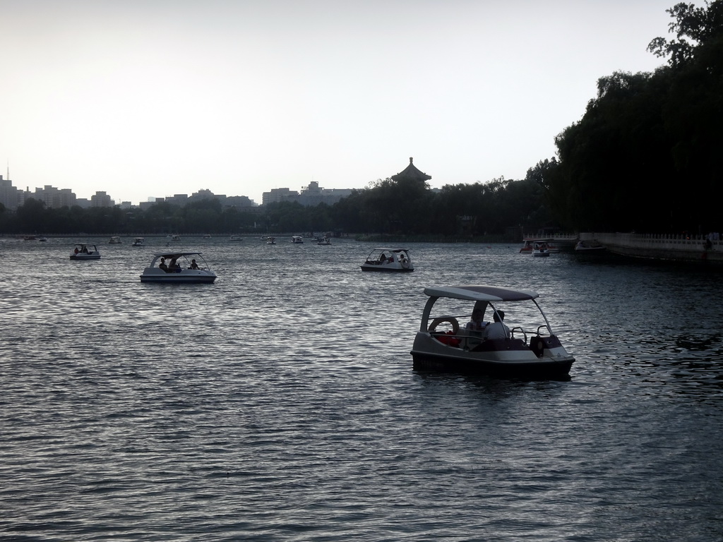 Boats on Houhai Lake and the pavilion at the Houhai Beiyan street, viewed from the Houhai Nanyan street