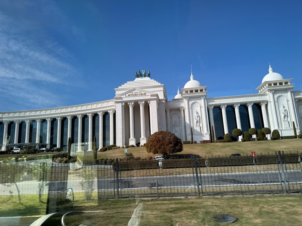 Northeast side of the Kingdom Hotel at the Shopping Avenue area of the Land of Legends theme park at the Atatürk Caddesi street, viewed from the bus