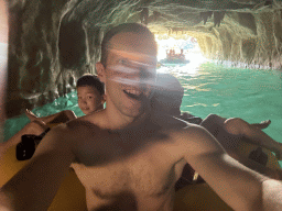 Tim, Miaomiao and Max in a tube at the Wild River attraction at the Aqua Land area of the Land of Legends theme park