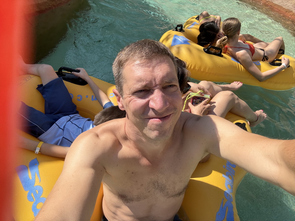 Tim, Miaomiao and Max in a tube at the Wild River attraction at the Aqua Land area of the Land of Legends theme park