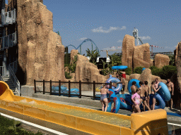 Miaomiao and Max with a tube walking to the start of the Tower Falls attraction at the Aqua Land area of the Land of Legends theme park