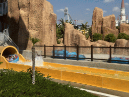 Miaomiao and Max in a tube at the bottom of the Tower Falls attraction at the Aqua Land area of the Land of Legends theme park